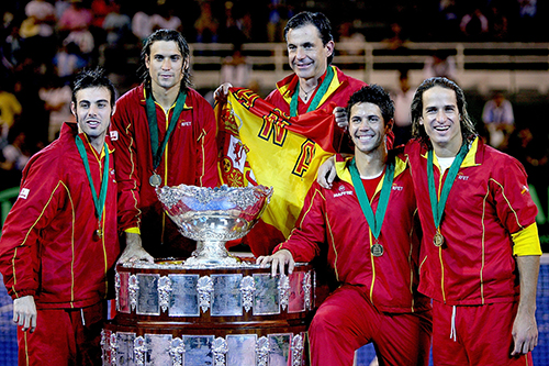 MAR DEL PLATA, ARGENTINA - NOVEMBER 23: Members of the Spanish team, Marcel Granollers, David Ferrer, head coach Emilio Sanchez, Fernando Verdasco and Feliciano Lopez, pose for photographers after defeating Argentina 3-1 in the Davis Cup final at Estadia Islas Malinas November 23, 2008 in Mar del Plata, Argentina. (Photo by Matthew Stockman/Getty Images) *** Local Caption *** Marcel Granollers;David Ferrer;Emilio Sanchez;Fernando Verdasco;Feliciano Lopez